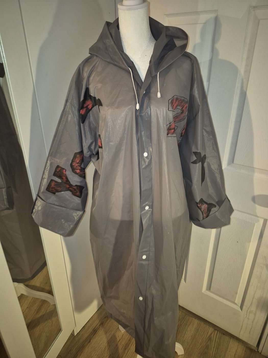 Grey rain jacket mannequin